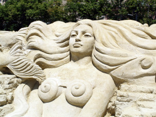 Картинка разное фигуры из песка льда снега девушка скульптура