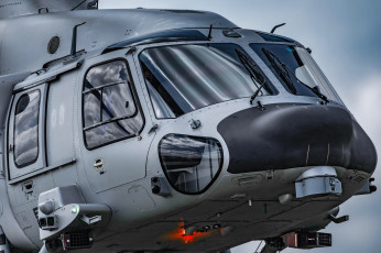 Картинка авиация вертолёты plaaf z20 военная машина вид спереди облака кабина ввс китая