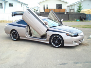 Картинка автомобили выставки уличные фото