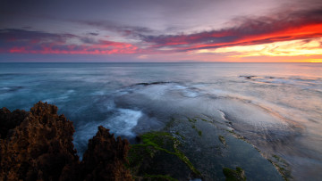 Картинка природа восходы закаты тина камни облака небо берег море закат вечер