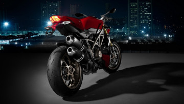 Картинка мотоциклы ducati дукати площадка ночь огни дома здания