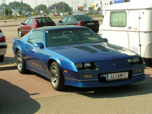 Картинка автомобили выставки уличные фото