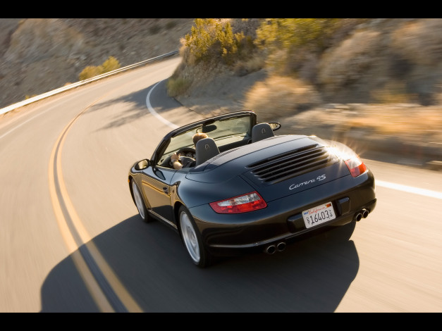 Обои картинки фото porsche, carrera, автомобили, скорость, дорога, поворот, кабриолет