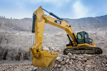 Картинка экскаватор+caterpillar техника экскаваторы экскаватор caterpillar карьер ковш камни