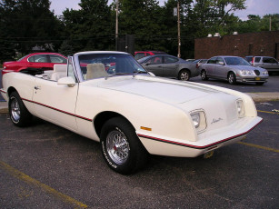 Картинка автомобили выставки уличные фото