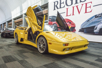 Картинка lotus автомобили выставки+и+уличные+фото автосалон выставка