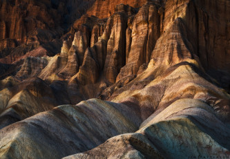 Картинка природа горы сша национальный парк бэдлендс холмы скалы свет вечер последние лучи