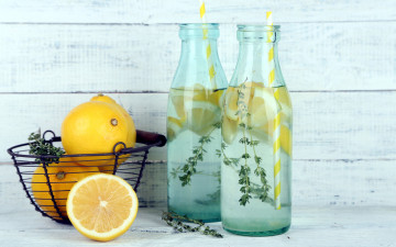 Картинка еда цитрусы корзинка лимоны трава трубочки бутылки доски