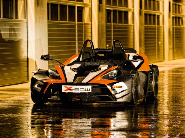 Обои картинки фото ktm x-bow, автомобили, ktm, черный, здание, лужи