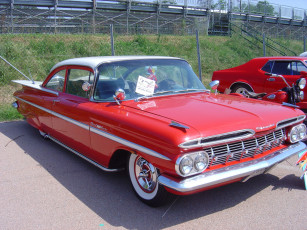 Картинка автомобили выставки уличные фото