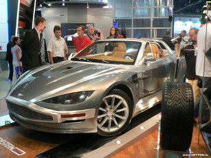 Картинка aston martin автомобили выставки уличные фото