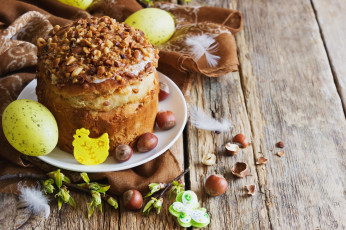 Картинка праздничные пасха еда easter орехи ткань ветки яйца тарелка выпечка праздник перья салфетка кулич