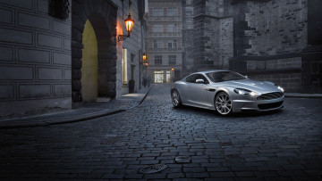 Картинка автомобили aston+martin серебристый город улица арка дома