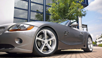 Картинка автомобили фрагменты+автомобиля бмв серебряный плитка здание дерево