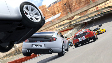 Картинка видео игры trackmania горы дорога машины 2