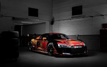 Картинка автомобили audi оранжевый гараж реклама lms r8 ауди
