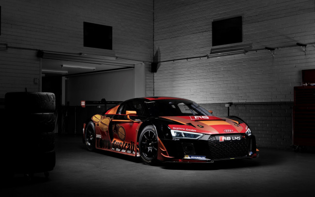 Обои картинки фото автомобили, audi, оранжевый, гараж, реклама, lms, r8, ауди