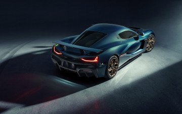 Картинка 2022+rimac+nevera автомобили rimac nevera вид сзади экстерьер суперкар синий спортивное купе