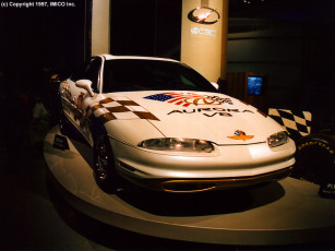 Картинка автомобили выставки уличные фото