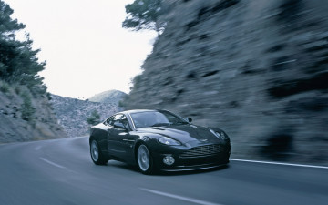 Картинка автомобили aston+martin темный дорога скорость склоны