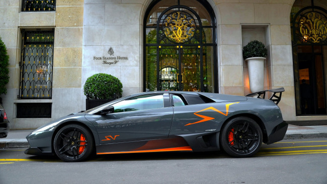 Обои картинки фото lamborghini, murcielago, автомобили, выставки, уличные, фото, скорость, мощь, автомобиль, стиль, изящество