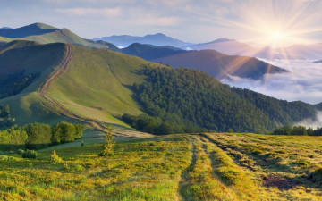 Картинка природа горы солнце туман дорога