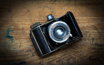 Картинка бренды -+другое царапины столешница черный камера фотоаппарат пятна