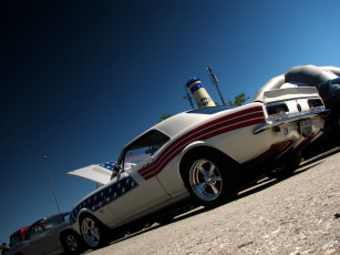 Картинка автомобили выставки уличные фото