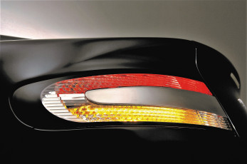 Картинка автомобили фрагменты+автомобиля астон мартин черный фара