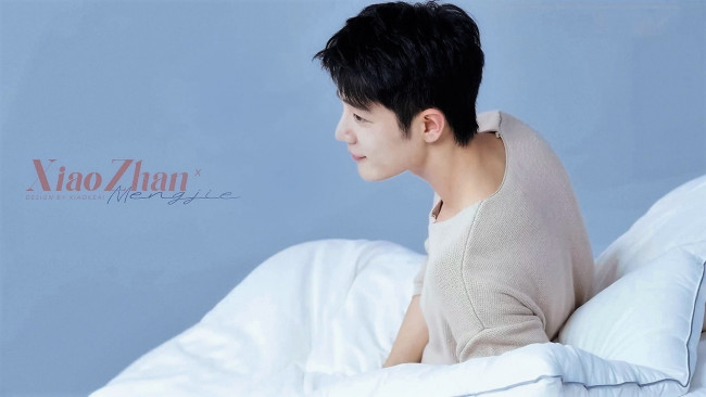 Обои картинки фото мужчины, xiao zhan, актер, свитер, постель